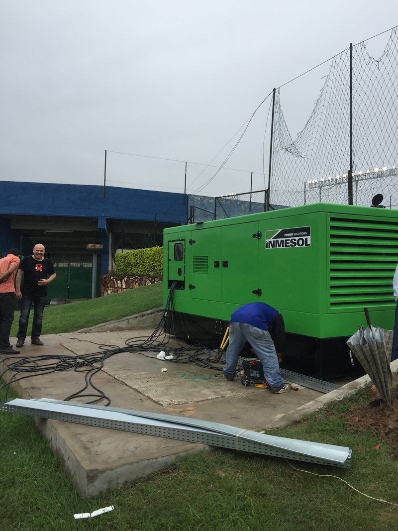 Grupo Gaia technicians working on an INMESOL generator set