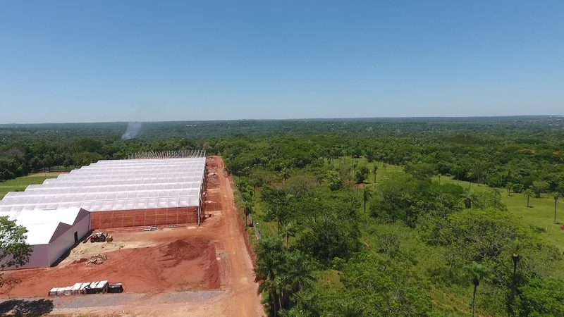 Greenhouse complex under construction, seen from a drone